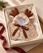 Editorial view of The Reindeer Cape styled for the Bello Parlour Christmas Edit.